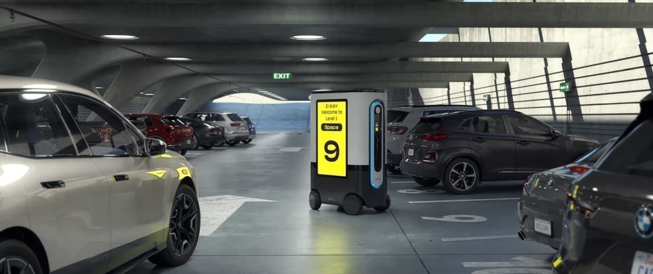 駐車場のどのスペースでもEV充電器を利用できる オンデマンドでEV充電器を増減できる ロボット充電器「ZiGGY」