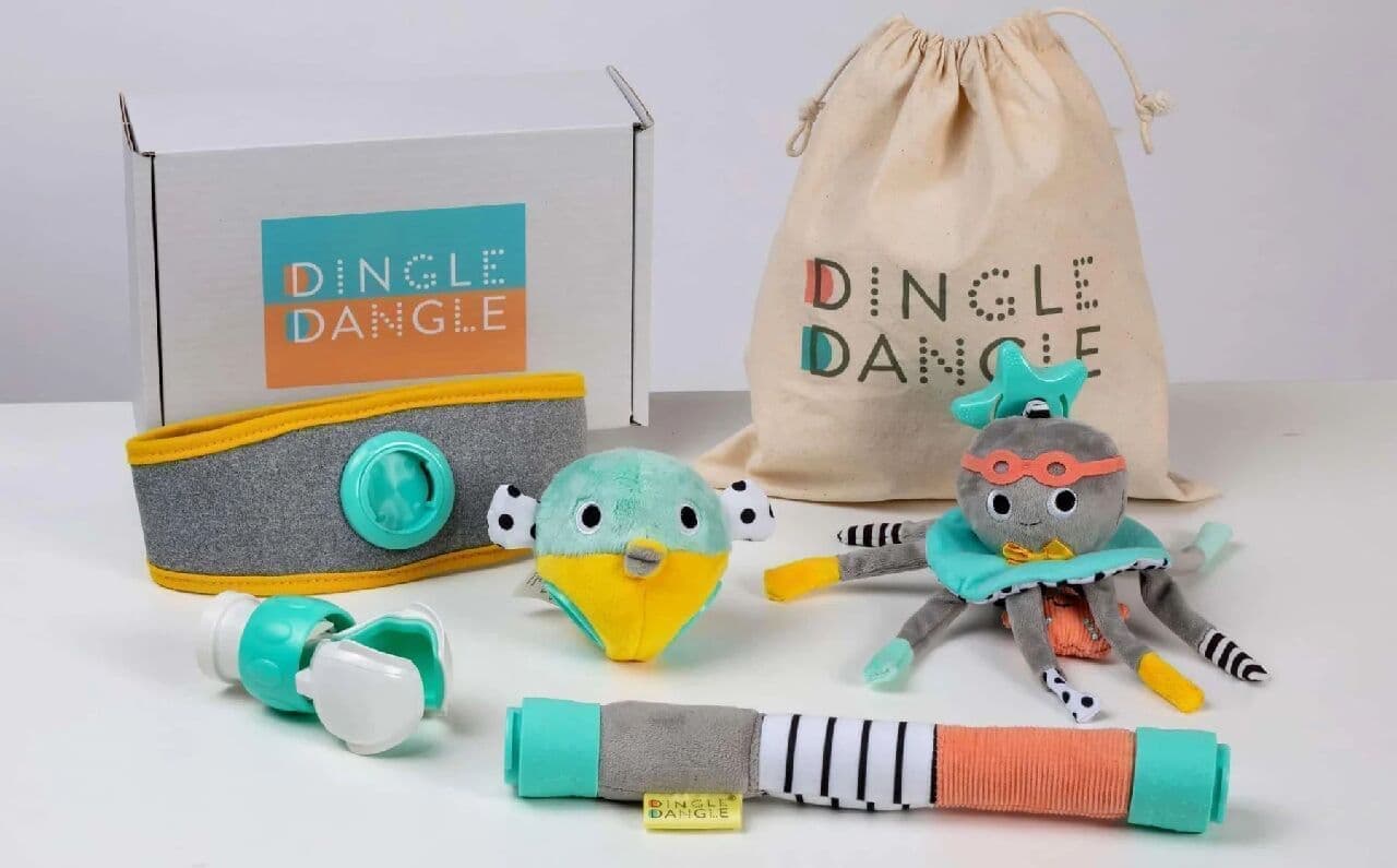 おむつ替えをしながら子どもをあやせる「Dingle Dangle」