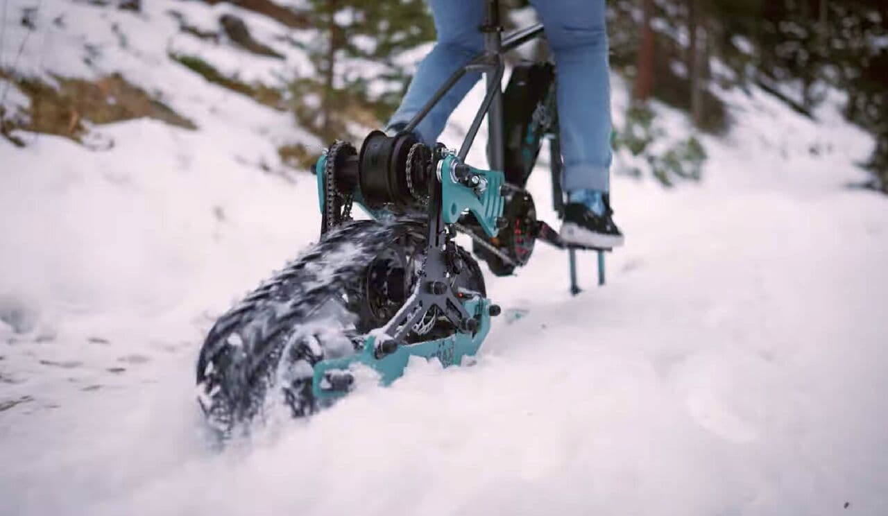自転車をキャタピラ付き雪上バイクにするキットFasterBikes「S-Trax」 電アシに装着すれば雪道も楽に走れる！